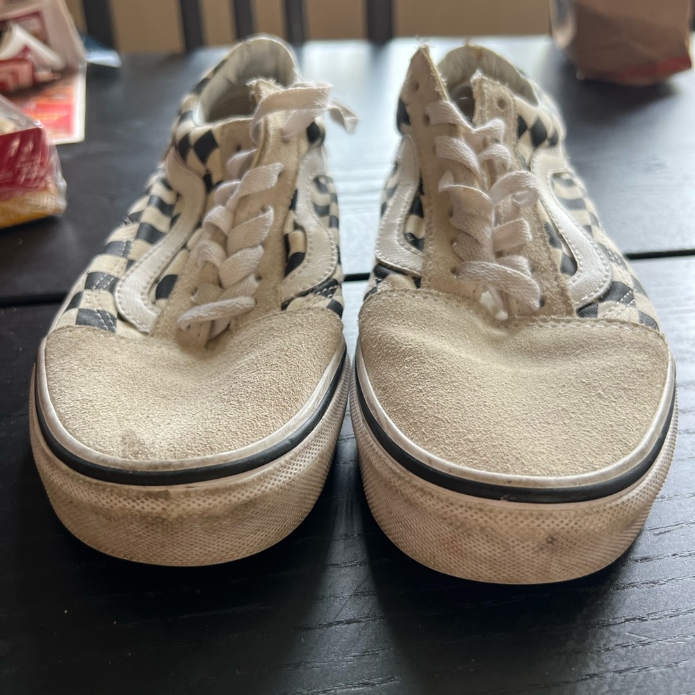 White and checkered era vans